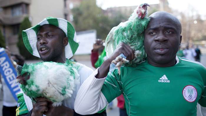 Nigeria fans carry chickens outside a World Cup stadium in South Africa in 2010.